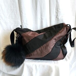 Louis Castel handbag with fur poof